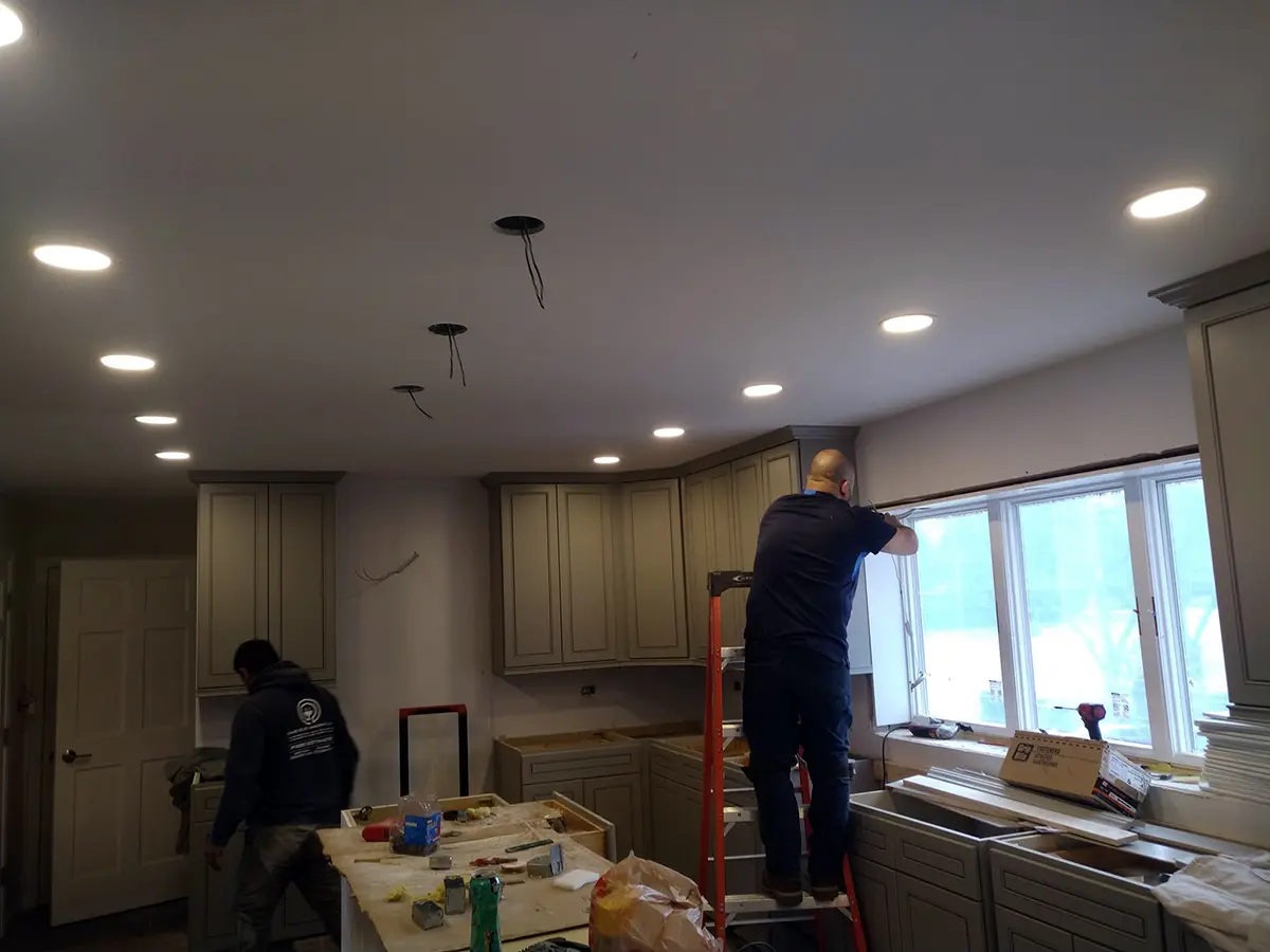 Finished Palatine kitchen with recessed and pendant lighting