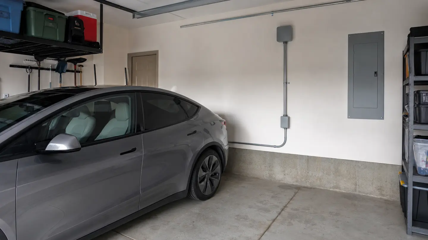 Garage prepared with electrical pathway and panel space for a future EV charger